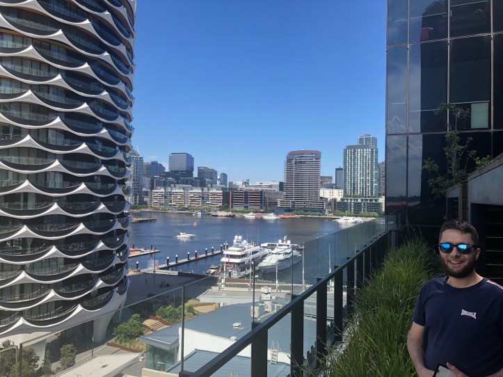Jim, enjoying the view from the pool area at Marina Tower, Docklands